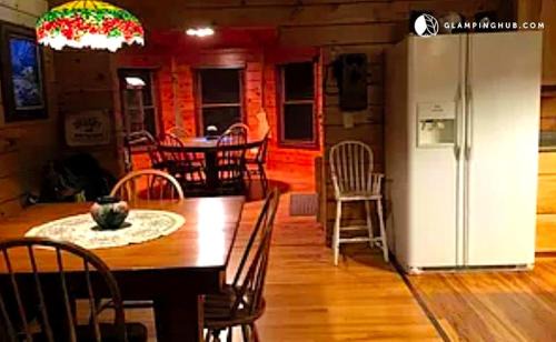 Eldorado House | Stunning Log Cabin Rental with a Fireplace near the Volga River State Recreation Area, Iowa