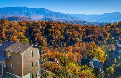 Chalet Village North Cabin | STUNNING Luxury Cabin! Game Room! 4 Fireplaces! Huge Decks Hot Tub! AMAZING View