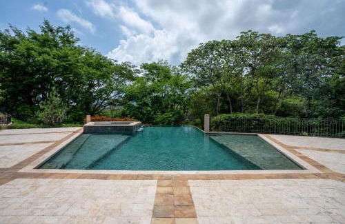 Playa Conchal House | Stunning Luxury Penthouse in Exclusive Beachfront Community with Resort-Style Amenities & Sweeping Views of the Ocean & Golf Course