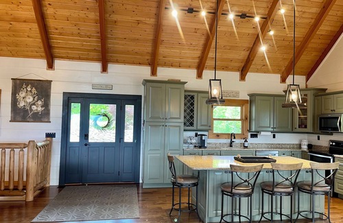 Chalet Village North Cabin | STUNNING MOUNTAIN VIEWS! Multiple HUGE Decks, Game Room, Fire Table, Hot Tub!
