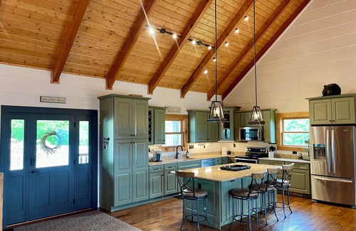 Chalet Village North Cabin | STUNNING MOUNTAIN VIEWS! Multiple HUGE Decks, Game Room, Fire Table, Hot Tub!
