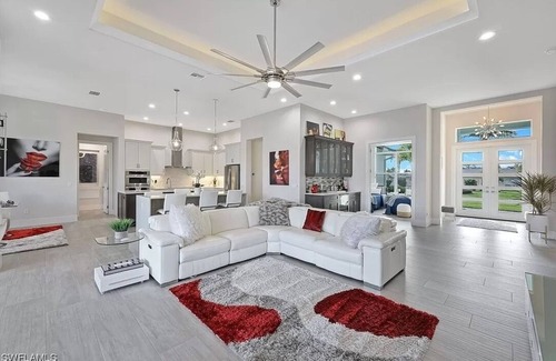 Pelican Villa | Stunning New Waterfront Luxury Villa with oversized Heated pool and Hot tub!