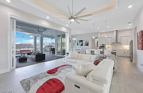 Pelican Villa | Stunning New Waterfront Luxury Villa with oversized Heated pool and Hot tub!