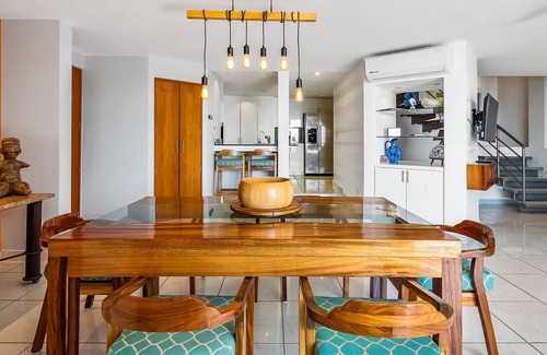 Conchas Chinas Apartment | Stunning ocean view apartment with hot tub, balcony, & AC- near beaches