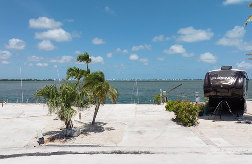 Cudjoe Key RV Rental | Stunning Open Water RV Lot with 38' Seawall and Great Amenities in Gated Community