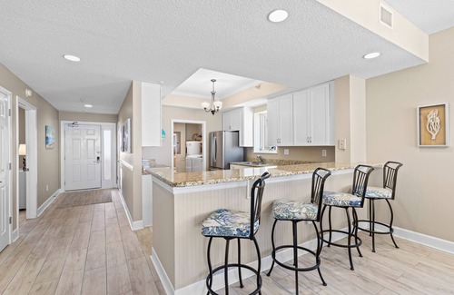 Navarre Beach Condo | Stunning Regency end unit with beach service!