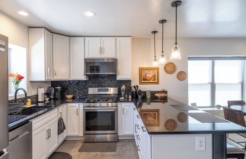 Tyrone House | Stunning remodeled 1900's adobe home in the center of the historic district