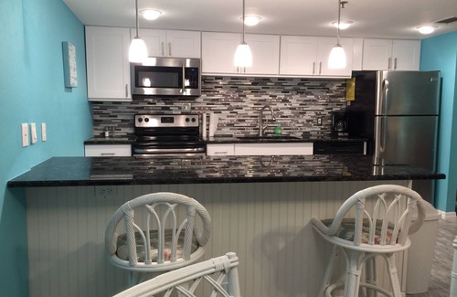 Indian Shores Condo | Stunning Renovated Oceanfront Condo with Intercostal Views from Balcony!