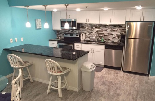 Indian Shores Condo | Stunning Renovated Oceanfront Condo with Intercostal Views from Balcony!