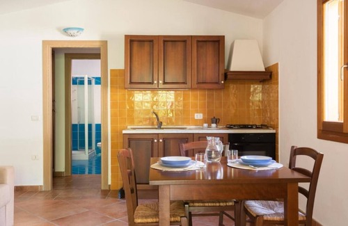 Tanaunella Apartment | Stunning Residence Bouganvillage Studio sleeps 2 plus child bed