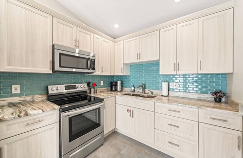 Orlando Beach Condo | Stunning Riverfront Balcony Views! W/Private Beach Access & Perfect Setting for Events