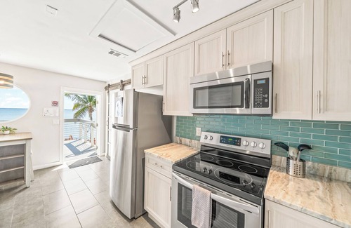 Orlando Beach Condo | Stunning Riverfront Suite W/Private Beach Access & Perfect Setting for Events