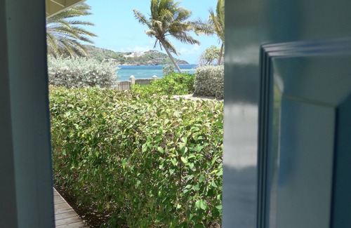 Falmouth Harbour Villa | Stunning six bedroom seafront villa with pool, garden and sea views
