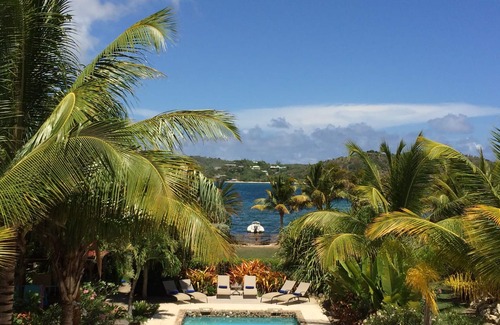 Falmouth Harbour Villa | Stunning six bedroom seafront villa with pool, garden and sea views