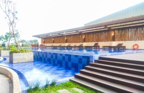 Cikarang Apartment | Stunning Studio Azalea Suites Apartment By Travelio