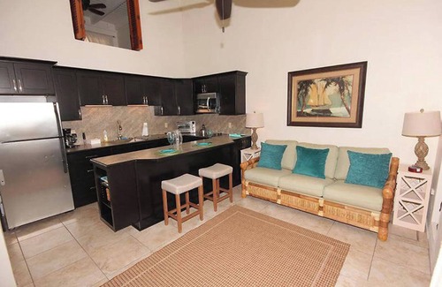 Estate Enighed Condo | Stunning Sunsets, Modern A/C, & Updated Living – Your Dream Condo Awaits!