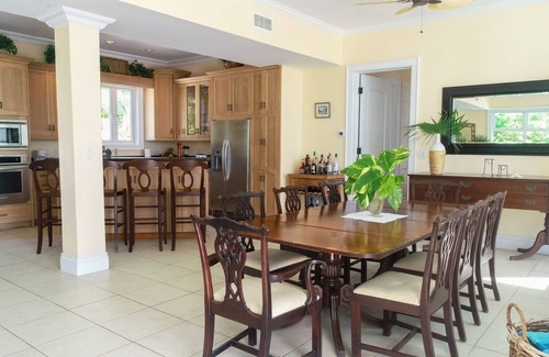 Dunmore Town House | Stunning waterfront property with panoramic sunset views + pool + dock