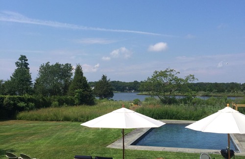 Sag Harbor House | Stunning Waterfront 4 Bedroom Home with Pool, a Dock, an Acre of Land & a Boat