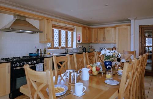 Eastbourne House | Stunning waterside six-bed house with water views, gardens and private jetty