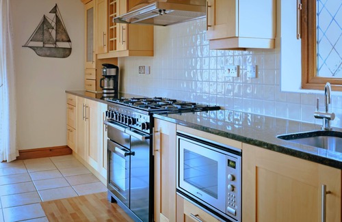 Eastbourne House | Stunning waterside six-bed house with water views, gardens and private jetty
