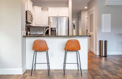 Central Business District Apartment | *Stylish 1BR Getaway w/KING Bed + Patio + Wi-Fi
