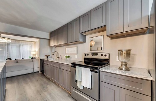 Old East Dallas Condo | Stylish 2-bed, 1 1/2 bath retreat in Central Dallas with private patio, pool access, and award-winning courtyard.