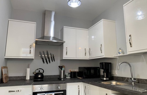 Belfast Central District Condo | Stylish 2-bed, 2-bath condo with private balcony
