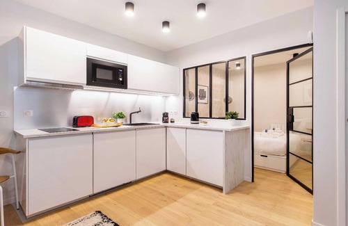 Strasbourg -Saint-Denis Apartment | STYLISH 2-BEDROOM PARISIAN APARTMENT IN PARIS'S VIBRANT BONNE-NOUVELLE