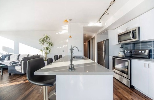 Wilburton Apartment | Stylish 2BR: City Views, Dual Workspaces & Gym Access