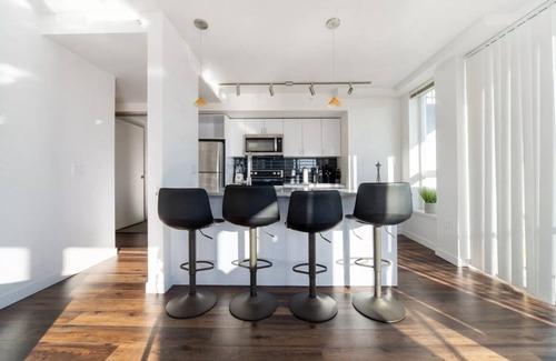 Wilburton Apartment | Stylish 2BR: City Views, Dual Workspaces & Gym Access