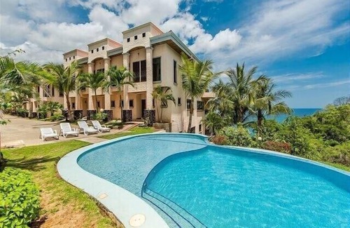 Playa Flamingo Condo | Stylish Condo | Pools + Ocean View