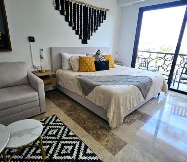 Gonzalo Guerrero Apartment | Stylish Condo with Roof top Ocean views near Mamitas Beach and 5th AVE