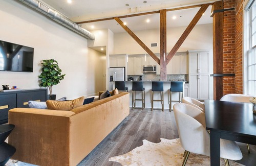 Central Business District Condo | 🖤⚜️STYLISH + HISTORIC Downtown Corner Condo Enjoy City views from your wrap around Balcony!
