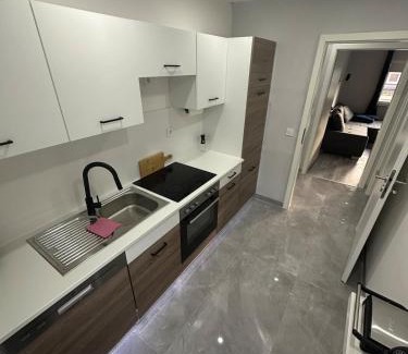 Buschhutten Apartment | Stylish Home Theater Apartment