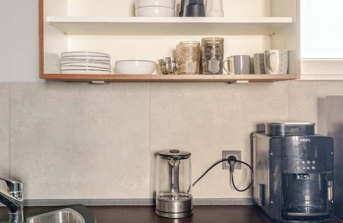 Wossingen House | Stylish loft with kitchen, carport, WiFi & fireplace