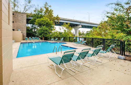 North Capitol House | Stylish Modern Condo with Free WiFi, Central AC & Shared Pool - Prime Locale!