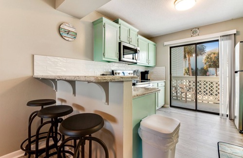 Navarre Beach House | Stylish townhome with sound view, W/D, & HEATED community pool