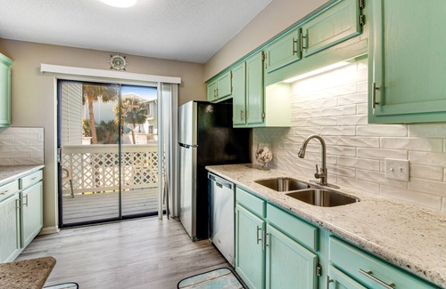 Navarre Beach House | Stylish townhome with sound view, W/D, & HEATED community pool