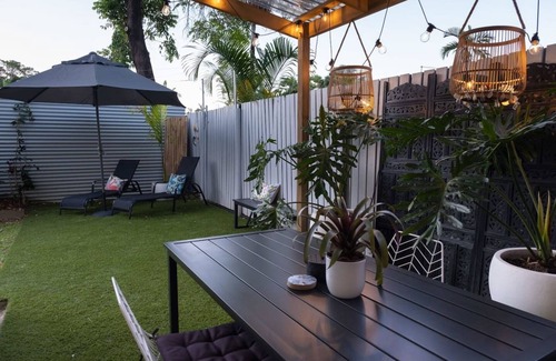 Parramatta Park Apartment | Stylish Tropical Retreat with Private Courtyard & Prime Location