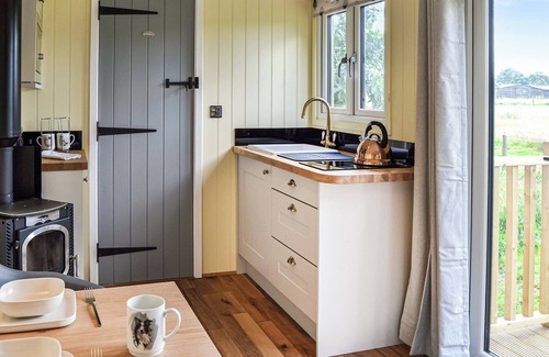 Irstead Cottage | Stylish with complete tranquillity, the perfect place to relax and unwind.