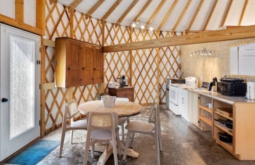 Stanley Cottage | Stylish yurt with luxurious king bed.