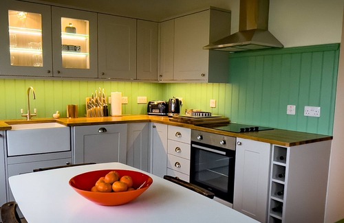 West Laroch Cottage | Stylishly renovated Croft house with uninterrupted views of fields, hills & sea