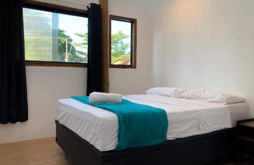 Jabaquara Apartment | Suíte Frente ao Mar