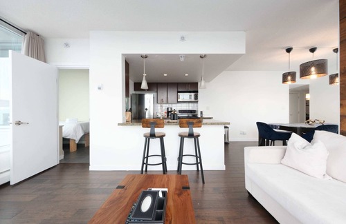 Crosstown Apartment | Sub-Penthouse Oasis with Jacuzzi, Pool, Sauna & Gym
