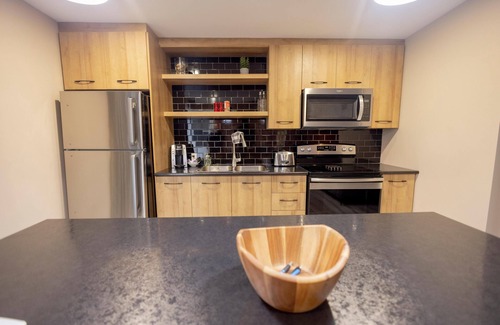 Rouyn-Noranda Apartment | Suite with closed bedroom in the city center (Le Court-toit)