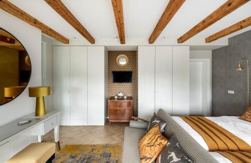 Kaunas House | Suite with private bathroom at three bedroom interwar Villa Grabyte with daily spaces to share by pine forest on the bank of the river- 8min by car from old town