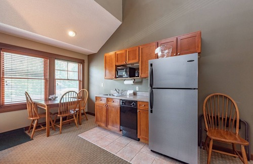 Thayerville Apartment | Suites at Silver Tree A304: Studio with Loft Suite, Fireplace, Private Balcony!
