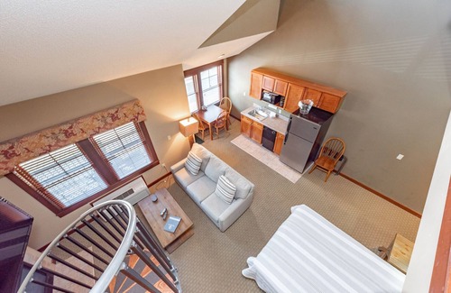 Thayerville Apartment | Suites at Silver Tree A304: Studio with Loft Suite, Fireplace, Private Balcony!