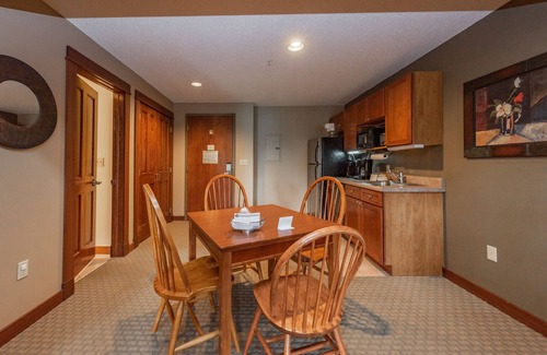 Thayerville Apartment | Suites at Silver Tree A311: One Bedroom King Suite with Loft and Lake View!