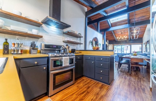 Mammoth Lakes House | Summer Getaways Available! Remodeled Townhome with Seasonal Pool, Fireplace, and Grill!